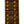 Leopold Woodworks handcrafted solid maple domino with dark walnut veneer pips showing a six-six double tile